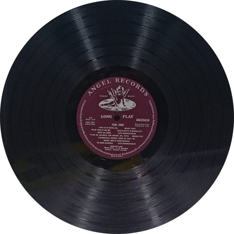 Yeh Zindagi Kitni Haseen Hai - 3AEX 5097 - LP Record Yeh Zindagi Kitni Haseen Hai (transl. This Life Is Beautiful) is a 1966 Hindi-language romantic drama film directed by R. K. Nayyar.[1] The film was produced by Nayyar fr his R. K. Nayyar Films banner. It had story and screenplay by Harish Kumar Mehra with dialogues by Agha Jani Kashmiri. Record Details Title Yeh Zindagi Kitni Haseen Hai - 3AEX 5097 Star Cast Saira Banu, Joy Mukherjee, Ashok Kumar, Manmohan, Madan Kumar, Motilal, Shyam Chatterji, Sayeeda Khan, Badri Prasad, Moshin Abdullah, B.S. Thapa, Jankidas, Hari Shivdasani, Kewal Kapoor & Vijay Bahel Director R. K. Nayyar Producer R. K. Nayyar Singer Asha Bhosle & Mohd. Rafi Music Ravi Lyrics Rajinder Krishan Releasing Year 1966 Manufacturing Year 1966 Language Hindi Genre Original Soundtrack Label Angel First Pressing Made In India Manufacture The Gramophone Company of India Limited Serial No 3AEX 5097 Side One · Jeene Ka Agar Andaz Aye Asha Bhosle · Nange Bazoo Nangee Rahen Mohd. Rafi · Jawan Ho Mashallah Tum Asha Bhosle Side Two · Yeh Zindgi Kitni Haseen Hai Mohd. Rafi · Hai Jo Koi Aake Rakh De Asha Bhosle · Jawan Ho Mashallah Tum Mohd. Rafi · Dekho Yeh Diwana Asha Bhosle Specification Size 12 Inches Speed 33 RPM Record Condition Excellent Cover Condition Excellent